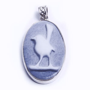 Wren, hand carved porcelain pendant set in sterling silver. Available in four colours.