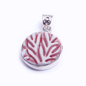 Coral is a hand carved round porcelain pendant glazed and set in sterling silver. Available in red, blue, grey and light blue.
