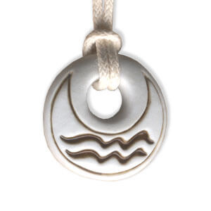 Aquarious zodiac pendant in porcelain by Belen Berganza