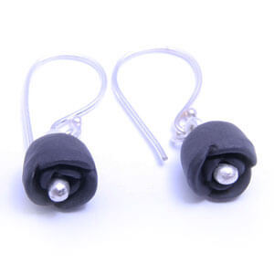 Black Rose is a handcrafted, delicate porcelain design earring.