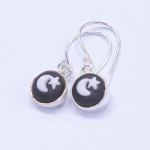 Moon is a small porcelain and sterling silver earring design