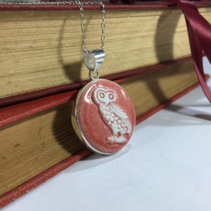 hand carved porcelain red owl cameo set in silver