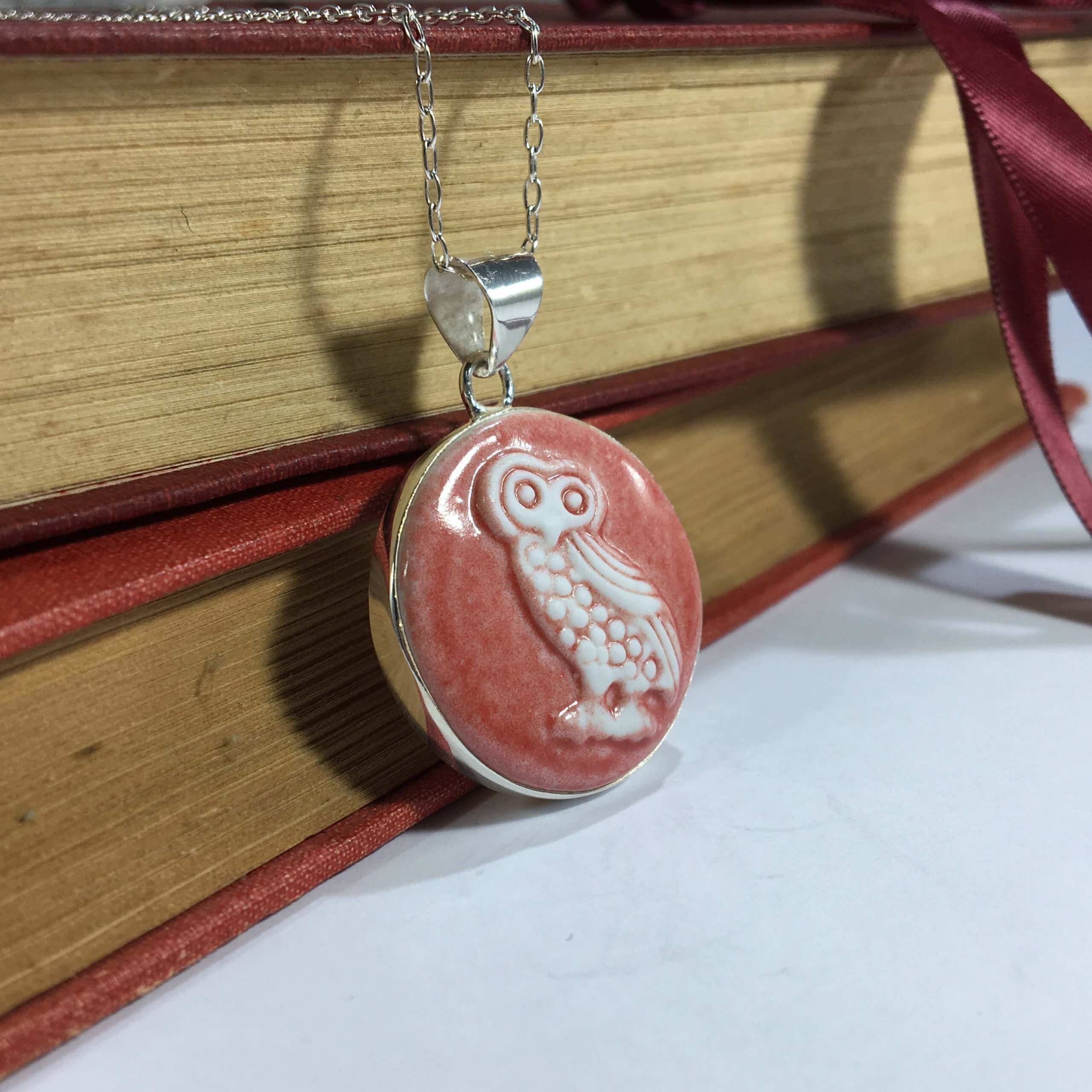 hand carved porcelain red owl cameo set in silver