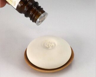 om-pebble essential oil drop-scaled.jpg
