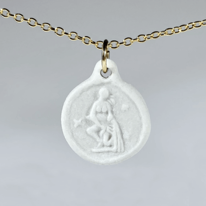Aquarius porcelain coin medallion