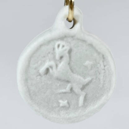 Aries white porcelain coin medallion