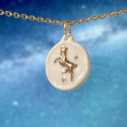 Aries porcelain and gold medallion