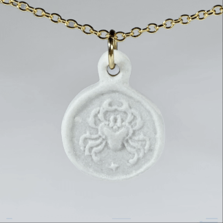 Cancer white porcelain coin medallion with gold chain