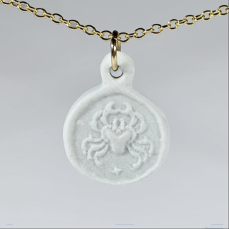 Cancer white porcelain coin medallion with gold chain
