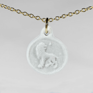 Leo white porcelain coin medallion with a gold chain