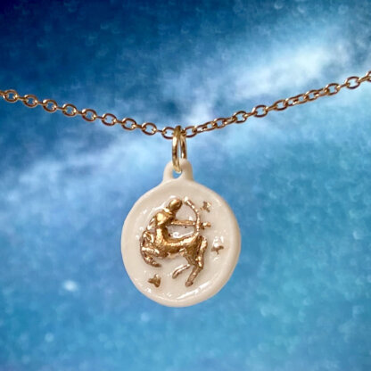 Sagittarius white and gold porcelain coin medallion with gold chain
