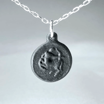 Sagittarius black porcelain coin medallion with silver chain
