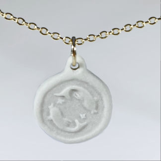 Pisces porcelain coin medallion