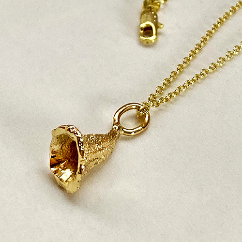 Medium Gold red gumnut side flat